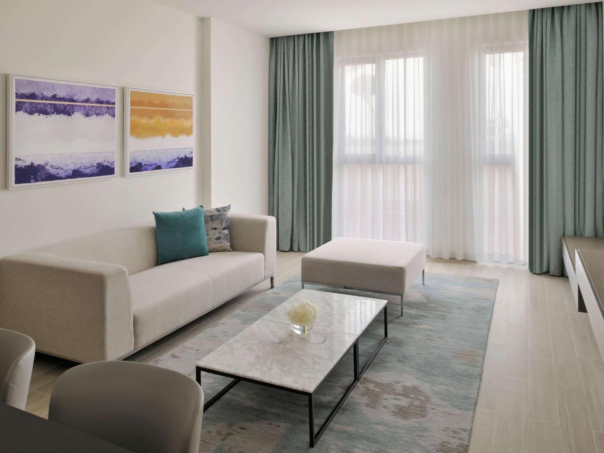 Moevenpick Hotel & Apartments Ghala مسقط المظهر الخارجي الصورة A living room